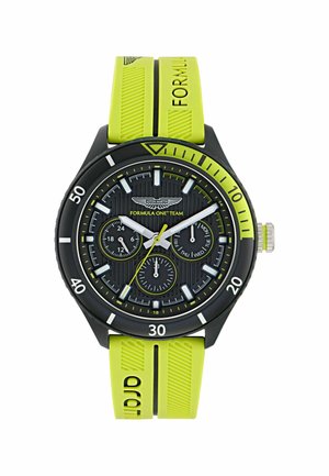 Black and neon yellow Aston Martin Formula One Team wristwatch with three subdials and a rubber strap embossed with "FORMULA."