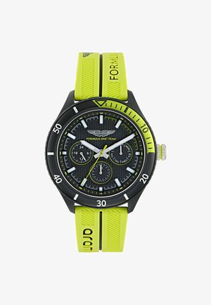 Black and neon yellow Aston Martin Formula One Team wristwatch with three subdials and a rubber strap embossed with "FORMULA."