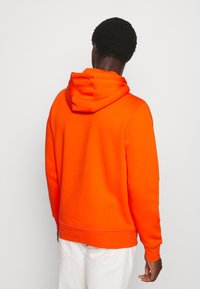 Tommy Hilfiger LOGO HOODY - Sweatshirt com capuz - daring orange