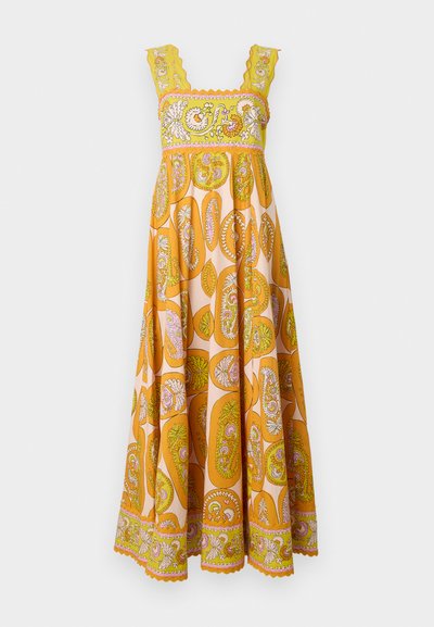 Mekko, joka on valmistettu kirkkaan oranssista ja keltaisesta polyesterista sekä paisley-kuvasta. Ominaisuuksiin kuuluvat aaltoilevat olkaimet ja koristeellinen tikkipitsi kaula-aukossa ja helman reunassa.