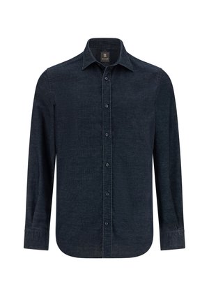 Tmavě modrá dlouhá košile s dlouhým rukávem vyrobená z texturované tkaniny, s výstřihem do špičky, knoflíkovým zapínáním a zakulaceným spodním okrajem. Knoflíky odpovídají barvě košile.