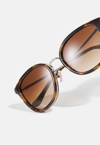COACH Óculos de sol - light gold-coloured/tortoise