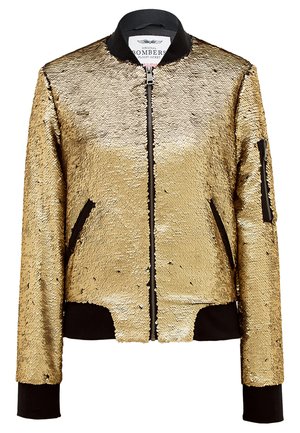 Gouden sequin bomberjack met zwarte ribgebreide manchetten en kraag. Voorzien van een ritssluiting aan de voorkant en een zijzak op de linkerarm.