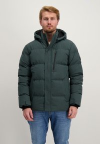 Gevoerde groene jas met een capuchon, rits aan de voorkant en contrasterende zwarte accenten. Beschikt over zijzakken en een gestructureerd, gebreid ontwerp.