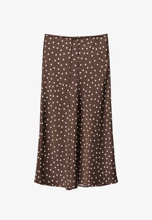 Fustă midi maro cu buline albe și o curea subțire cu nod în talie, realizată dintr-un material neted și fluid.