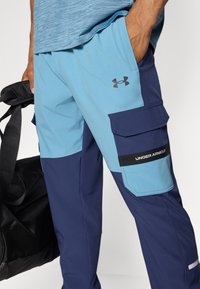 Under Armour UTILITY PANT - Tracksuit bottoms - washed navy/blue smoke/black