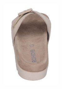 Beige slip-on sandal with suede upper, wide strap closure, contoured footbed, and lightweight platform sole. Features logo on insole.