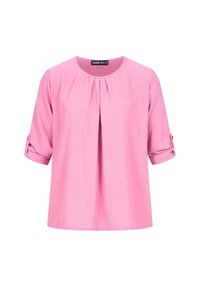 Blusa rosa a maniche corte con scollo rotondo, caratterizzata da una piega frontale e maniche arrotolate fissate con bottoni. Tessuto strutturato.