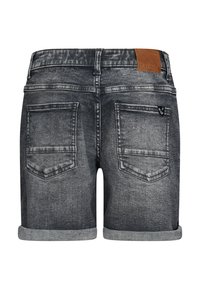 Szare szorty dżinsowe o lekko wyblakłej teksturze. Posiadają podwinięte mankiety i dwie tylne kieszenie, akcentowane brązową skórzaną metką na biodrze.