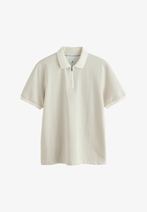 Korte mouwen polo-shirt in crème met een textuurpatroon, voorzien van een driekwartrits en een geribbelde kraag in een bijpassende tint.