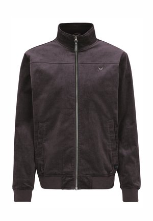 Dunkelbraune Cordjacke mit durchgehendem Frontreißverschluss, Stehkragen, zwei Fronttaschen, gerippten Bündchen und dezentem, auf der Brust gesticktem Logo.