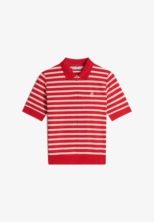 Red striped polo shirt featuring alternating broad and narrow white stripes, short sleeves, and a solid red collar and hem.