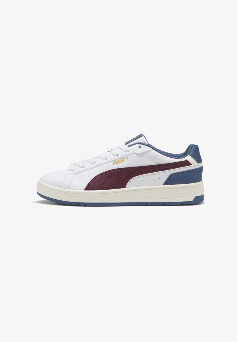 White leather sneakers with maroon and navy accents, featuring a textured panel, padded collar, and rubber sole with detailed stitching.
