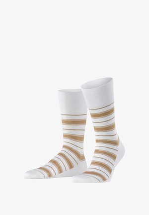 Chaussettes blanches avec des rayures alternées dorées et blanches. Le design présente une texture lisse et une longueur classique de mi-mollet.