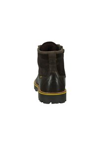 Brown leather and suede ankle boot with a textured finish, yellow accent on the sole, and a rear zipper for easy access.