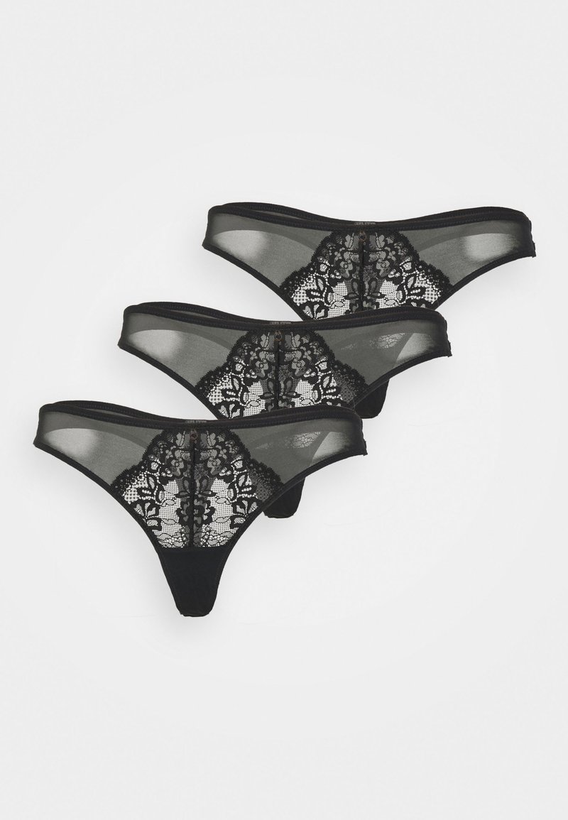 Zwart tangalingeriesetje met een doorzichtige mesh voorkant en intricante kanten details aan de achterkant, voorzien van een gladde tailleband en minimale stiksels.