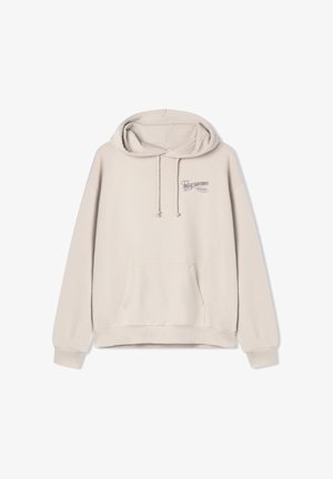 Jasno beżowa bluza z kapturem, wykonana z miękkiego materiału, z przednią kieszenią, sznurkiem w kapturze oraz haftowanym napisem na piersi.