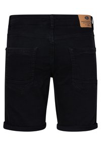 Pantaloni scurti in denim nero con orlo arrotolato, due tasche posteriori e un'etichetta in pelle beige sul cinturino.