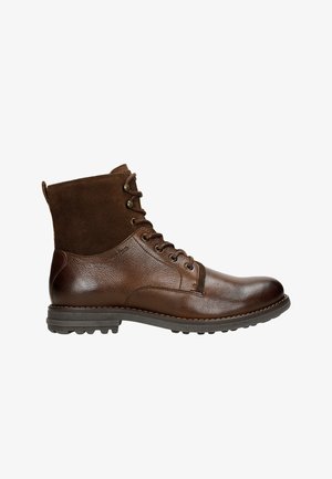 Hnědé kožené a semišové kotníkové boty s šněrováním vpředu, kulatou špičkou, strukturovaným svrškem a robustní podrážkou pro lepší přilnavost.