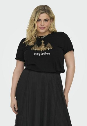 T-shirt noir à manches courtes avec des motifs d'arbres dorés et le texte "Joyeux Noël", associé à une jupe plissée noire.