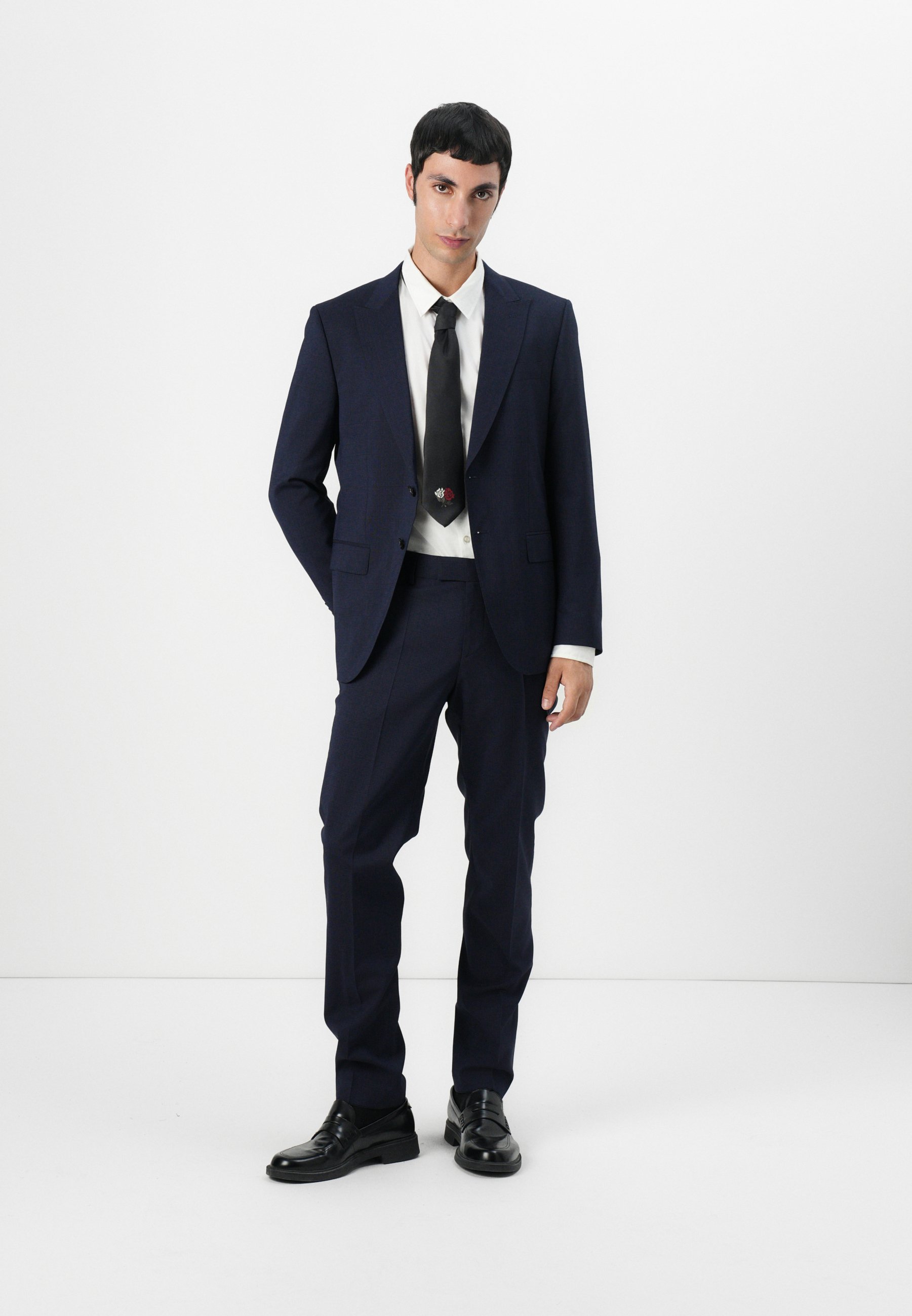 blue coat pant with black shoes