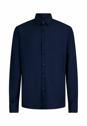 Námořnická košile s dlouhým rukávem, s límečkem na knoflíky, předním zapínáním na knoflíky a manžetami. Vyrobena z hladkého materiálu v jednotné barvě.