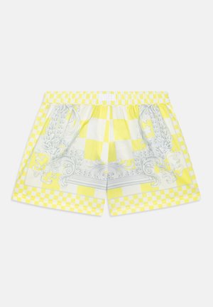 Gule og hvide ternede shorts med et udsmykket gråt rullemønster foran og ternet linning og kant.