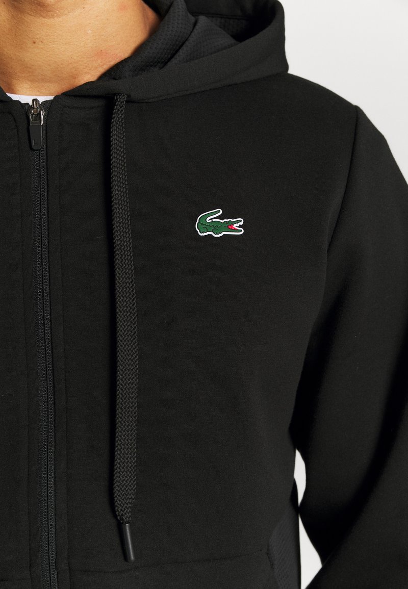 all black zip up hoodie