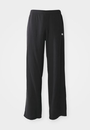 Schwarze, weit geschnittene Lounge-Hosen mit einem elastischen Bund und glatter Textur. Mit einem kleinen bestickten Logo auf der Vorderseite.
