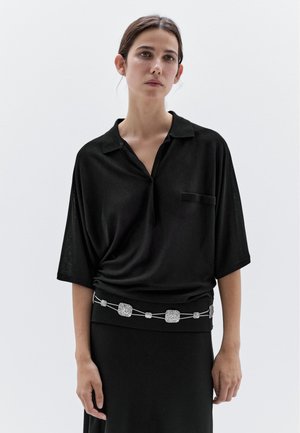 - Koszulka polo