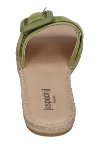 Green suede slide sandal with a wide strap and a large square buckle, featuring a braided jute sole and a soft, textured insole.