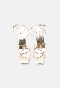 Simmi London MOON - Magas sarkú szandálok - gold-coloured