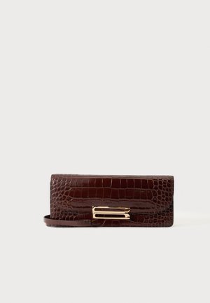 Dark brown crocodile-texture clutch purse with gold rectangular clasp and wrist strap on a plain background.