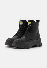 Buffalo Bottines à plateau - black