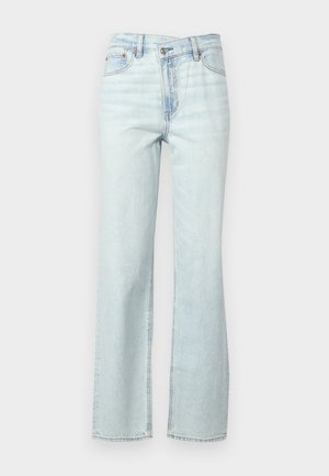 Light blue denim flared jeans with a medium rise, a classic five-pocket design, and visible stitching along the sides and waistband.