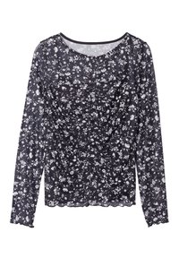 Haut noir à manches longues avec un design froncé orné de motifs floraux blancs. L'ourlet et le col à volants ajoutent de la texture et des détails.