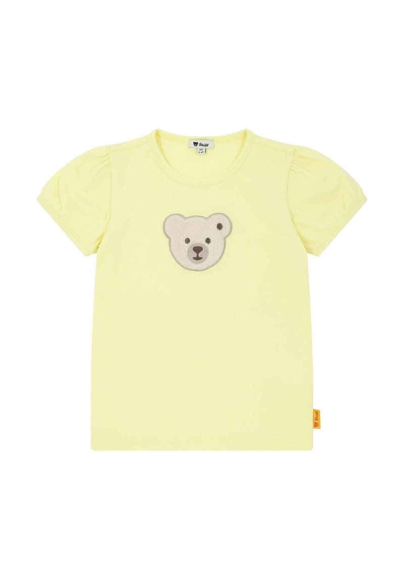 T-shirt giallo a maniche corte con scollatura rotonda e maniche a sbuffo, caratterizzato da un'applicazione a forma di faccia d'orso grigia e beige al centro.