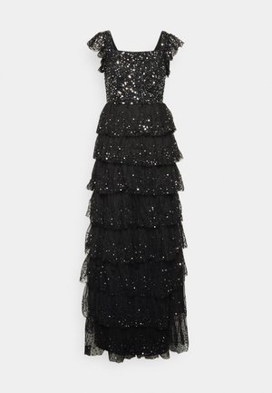 Robe noire longueur au sol avec un corsage à sequins, des manches courtes à volants et des couches de jupe à volants étagés ornées de sequins dispersés.