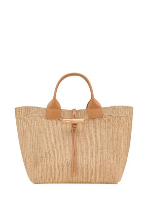 Geflochtener Strohtasche in Beige mit Lederakzenten, ausgestattet mit zwei Tragegriffen oben und einem gebundenen Verschluss. Strukturierte Oberfläche mit vertikalen Nähten.