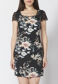 Schwarzes Blumenmusterkleid mit kurzen Spitzensäumen, Schlüsselloch-Ausschnitt und bunten Blumenmustern in Pfirsich, Creme und Grün überall.