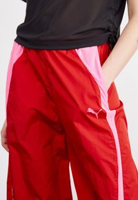 Puma DARE TO PARACHUTE PANTS - Hlače - for all time red