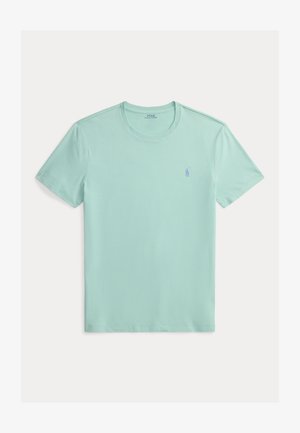 Camiseta de manga corta en verde menta claro de algodón suave, con escote redondeado y un pequeño logo del mismo color en el pecho.