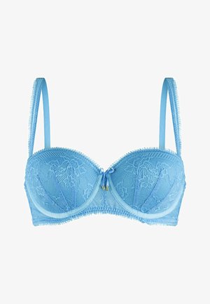 Light blue lace bra featuring underwire cups, adjustable straps, and a small bow detail at the center. Soft floral pattern throughout.