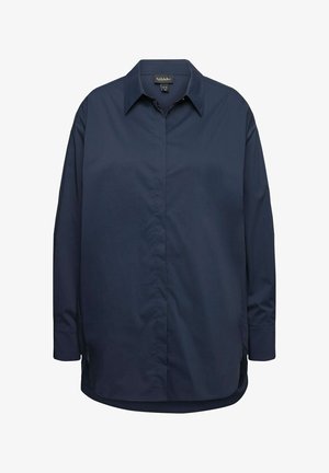 Mørkeblå skjorte med knapper lavet af glat stof, med spidse kraver, lange ærmer, lige kant og sideåbninger i bunden.