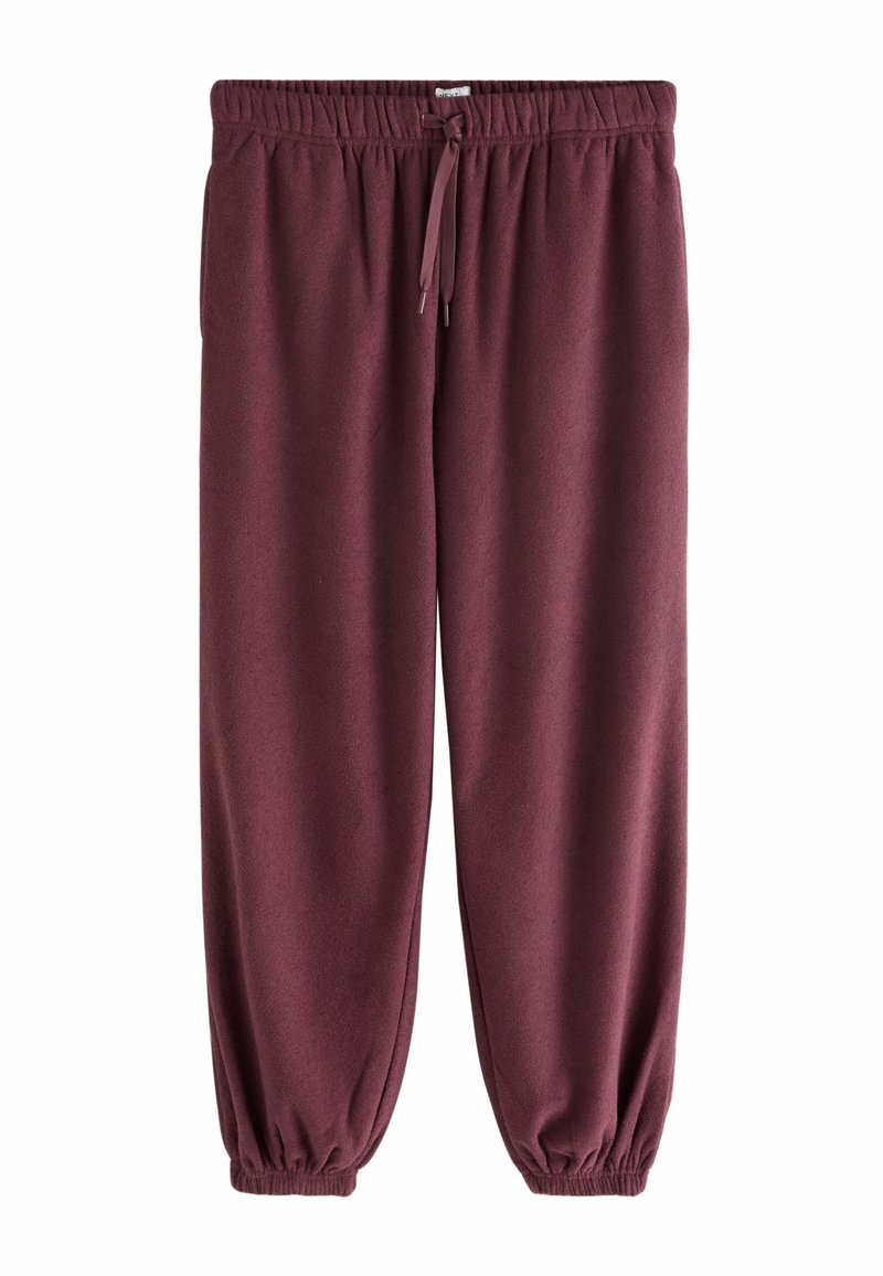Burgunderfarbene Sweatpants aus weichem, strukturiertem Stoff. Mit einem elastischen Bund und einem Kordelzug sowie elastischen Bündchen am Knöchel.