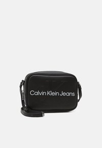 SCULPTED CAMERA MONO - Cross body bag - black