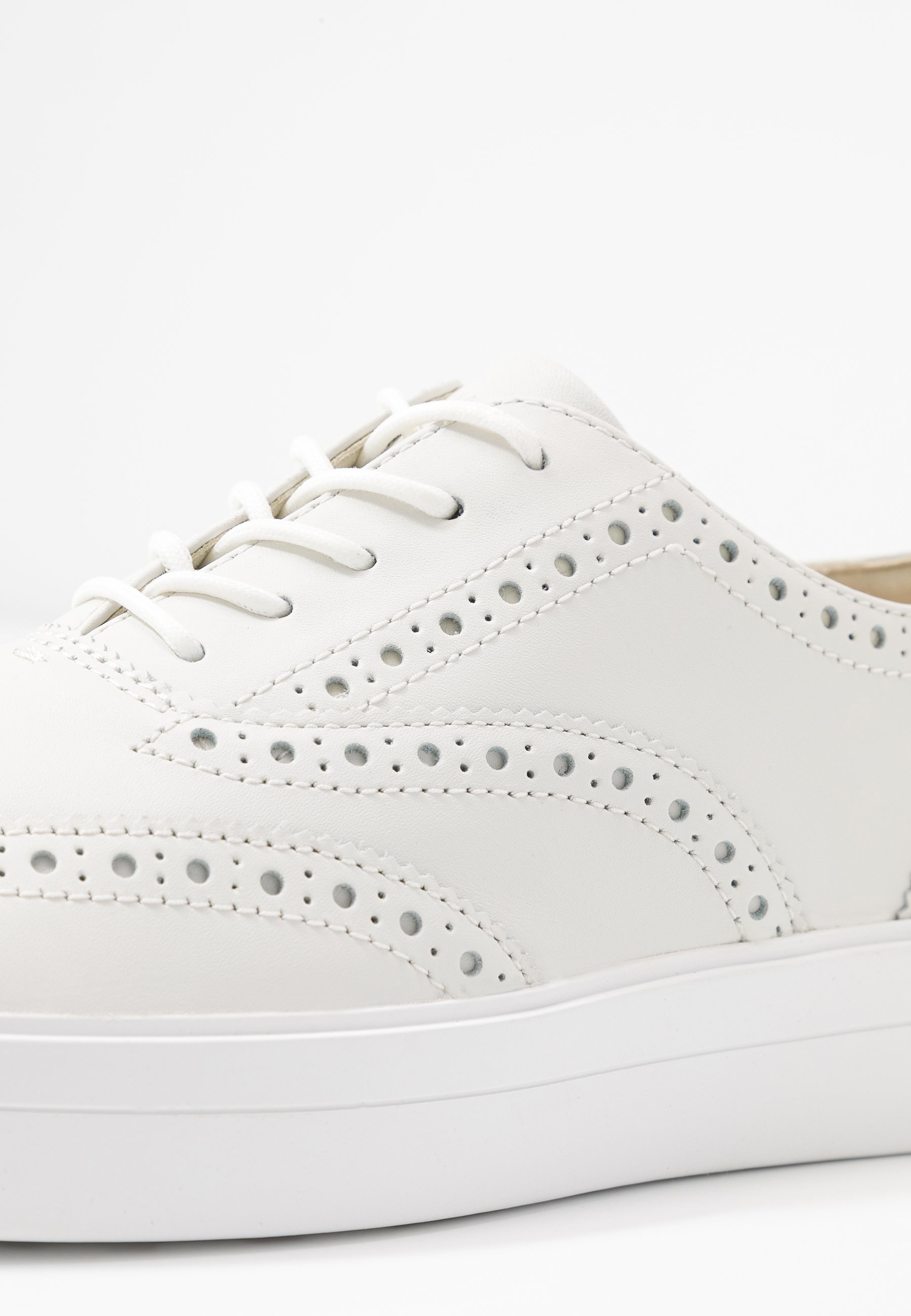 white brogue trainers