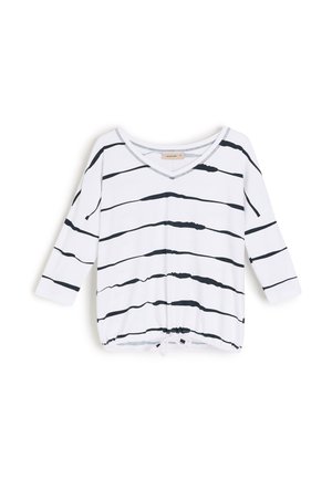 Biała koszula z długim rękawem z nieregularnymi czarnymi poziomymi paskami, dekoltem w serek i regulowanym ściągaczem na dole.