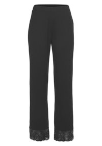 Zwarte broek met een elastische tailleband, met wijde pijpen. De manchetten zijn versierd met ingewikkelde zwarte kantdetails.