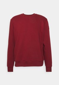 Felpa bordeaux con maniche lunghe, collo rotondo, polsini e orlo a coste. Texture liscia con un design semplice, senza motivi o accenti visibili.